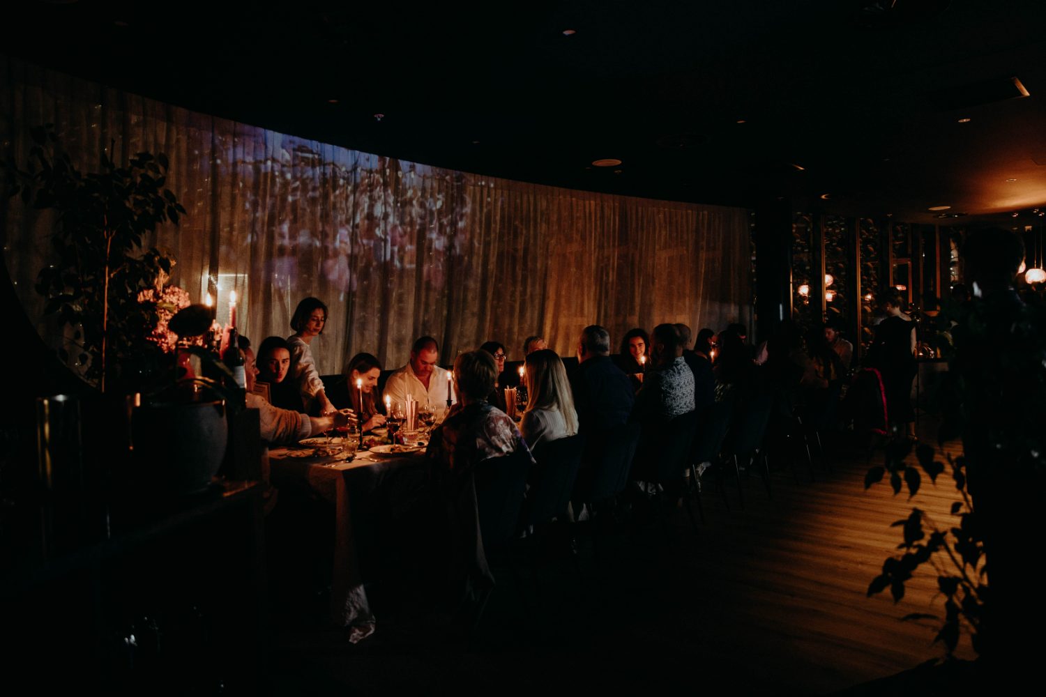 A candlelit private event filling the dining room at Bar Franco, Christchurch