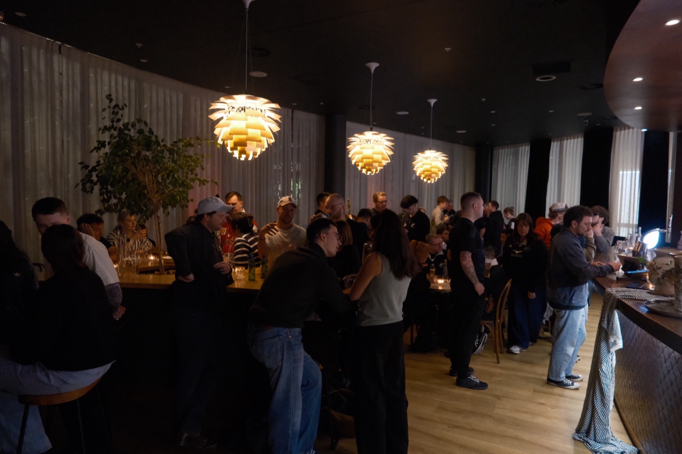 Guests gathered at the Level 1 Negroni Bar during a function at Bar Franco