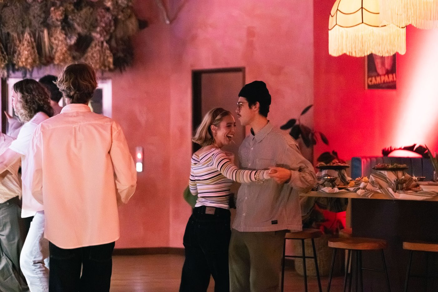 A guest laughing on the dance floor