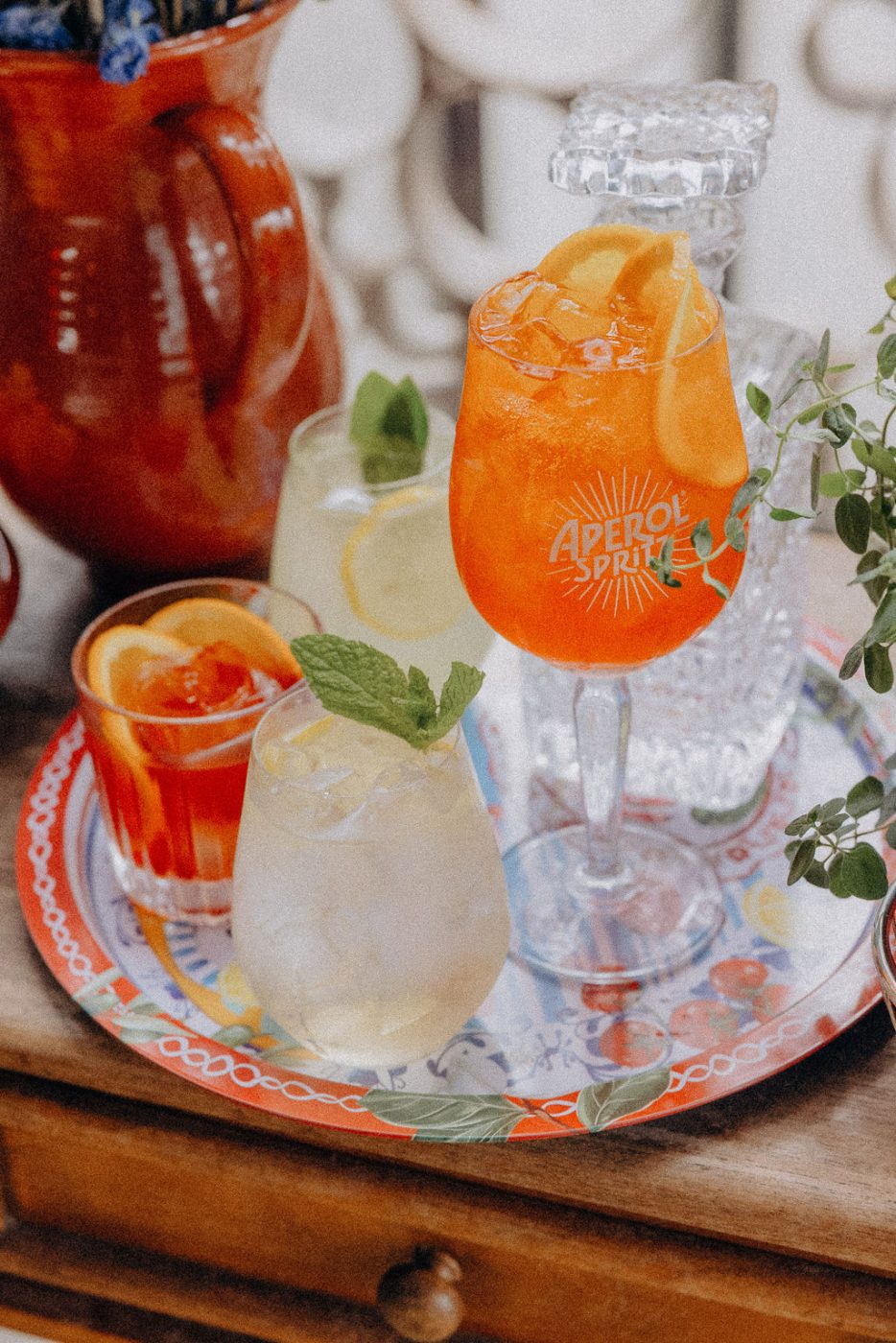Aperol spritz and cocktails on a tray at Bar Franco